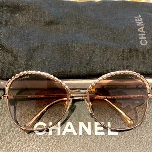 Chanel sunglasses, pink and gold .